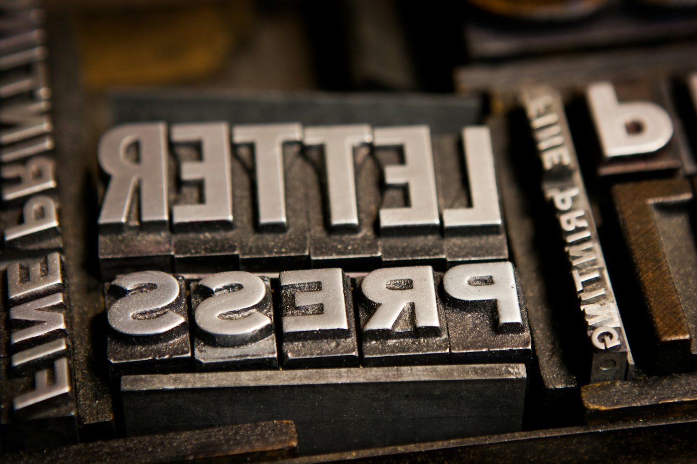 Close-up of metal letterpress type locked in a forme